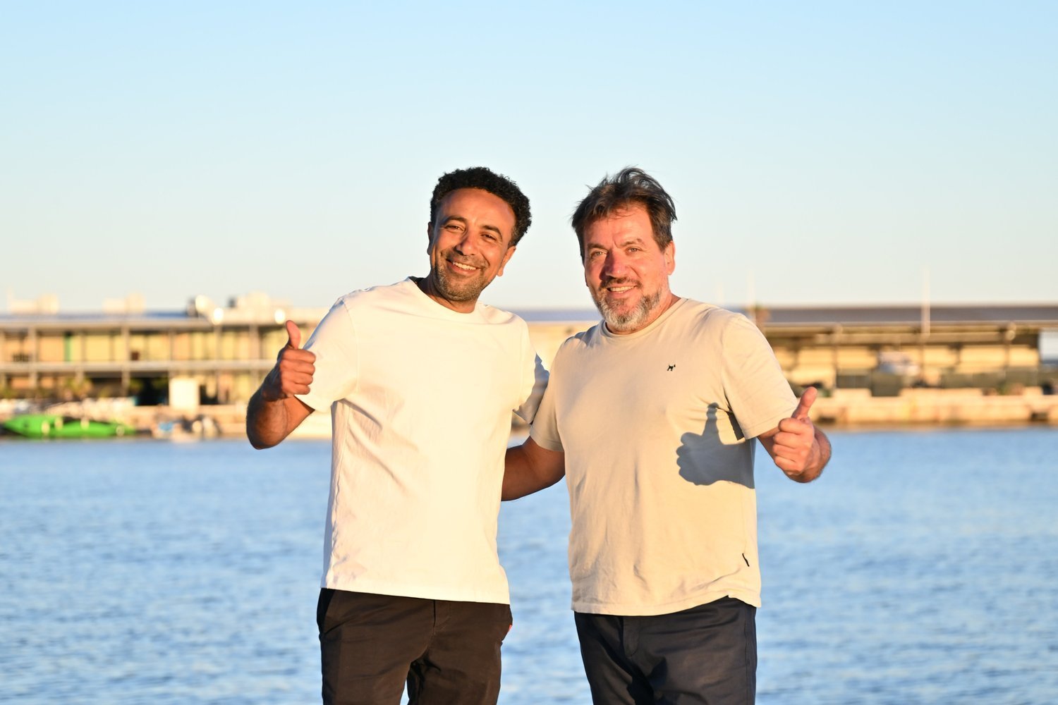 Dialo and Ian, the founders of Calma Tours, on the Alicante marina